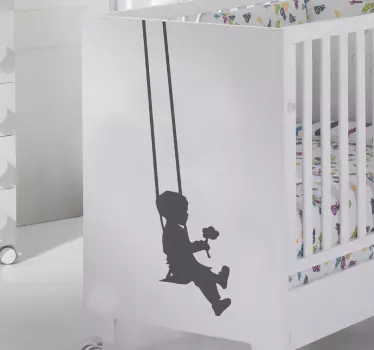 Gyerekek sziluett fiú hinta matrica - TenStickers